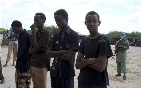  Islamist insurgents sentence four men to amputation in Mogadishu after they were accused of theft of a pistol and three mobile phones (Reuters)